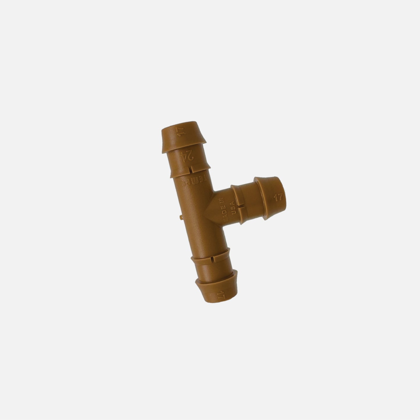 A brown 1/2" barbed drip tube tee fitting on white background. 