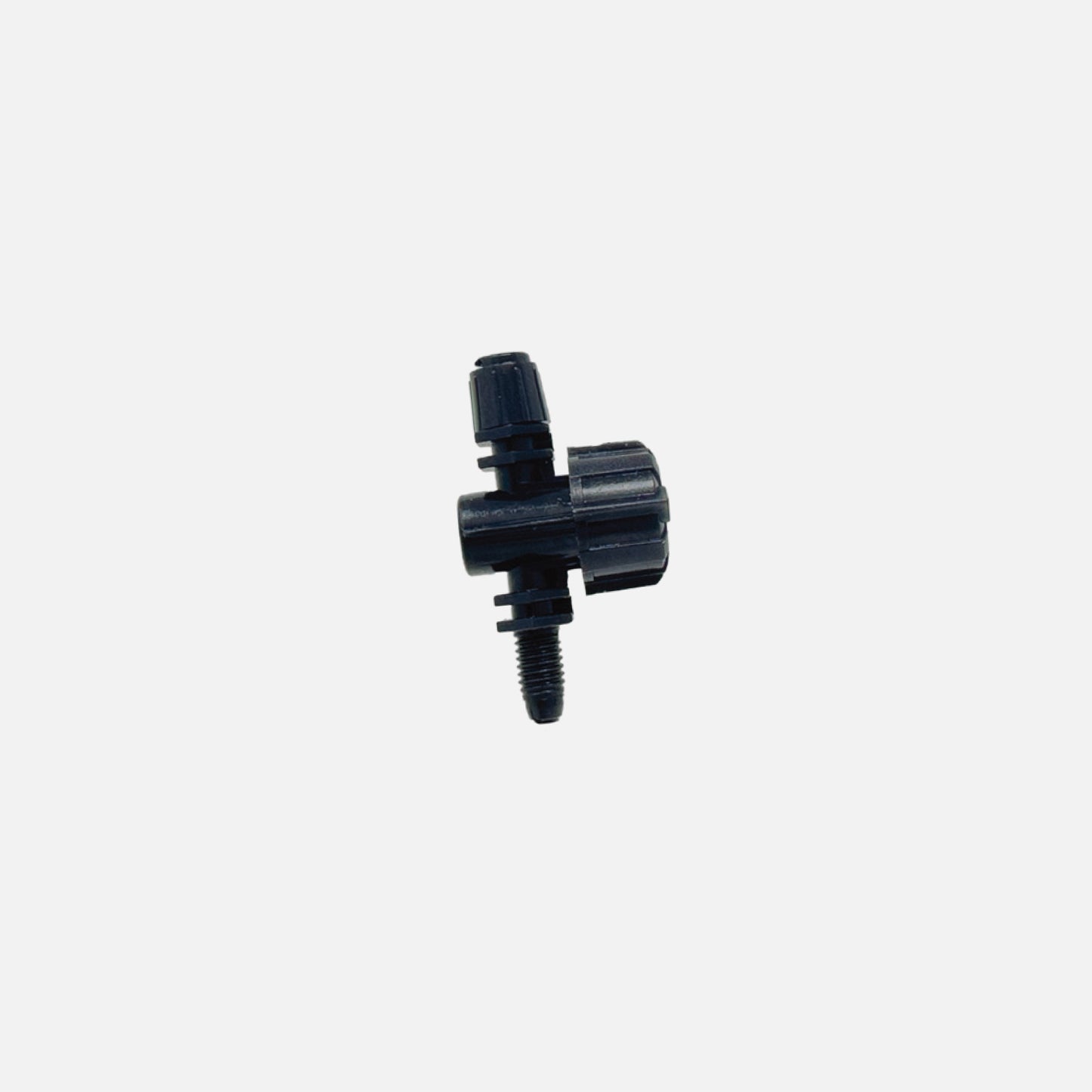 A black 90-degree spray head with adjustable flow, designed for use in lawn and garden irrigation systems.