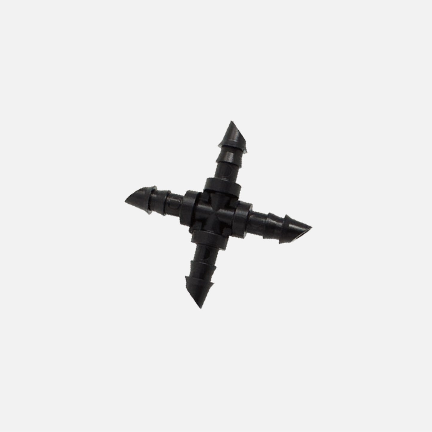 A black 1/4" barbed drip tubing cross cross made of uv resistant plastic, used for routing dripper lines in multiple directions on white background. 