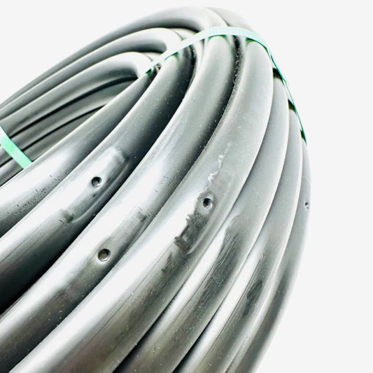 Sprinkland 1/2" dripper line 100 ft coil on white background