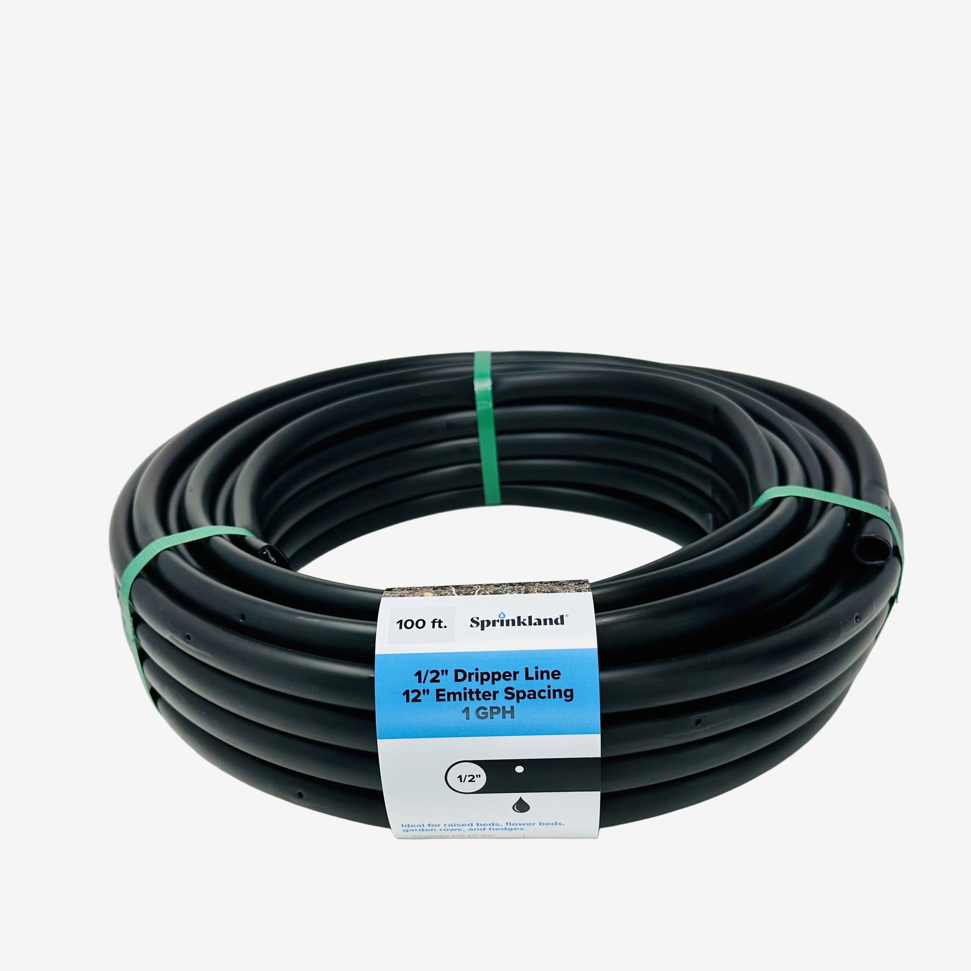 Coiled black drip irrigation dripper lin with a label on a white background
