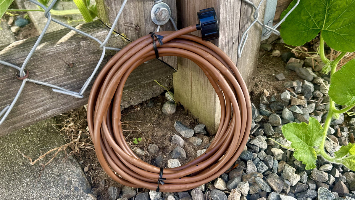 18 foot coil drip irrigation soaker hose for gardening.